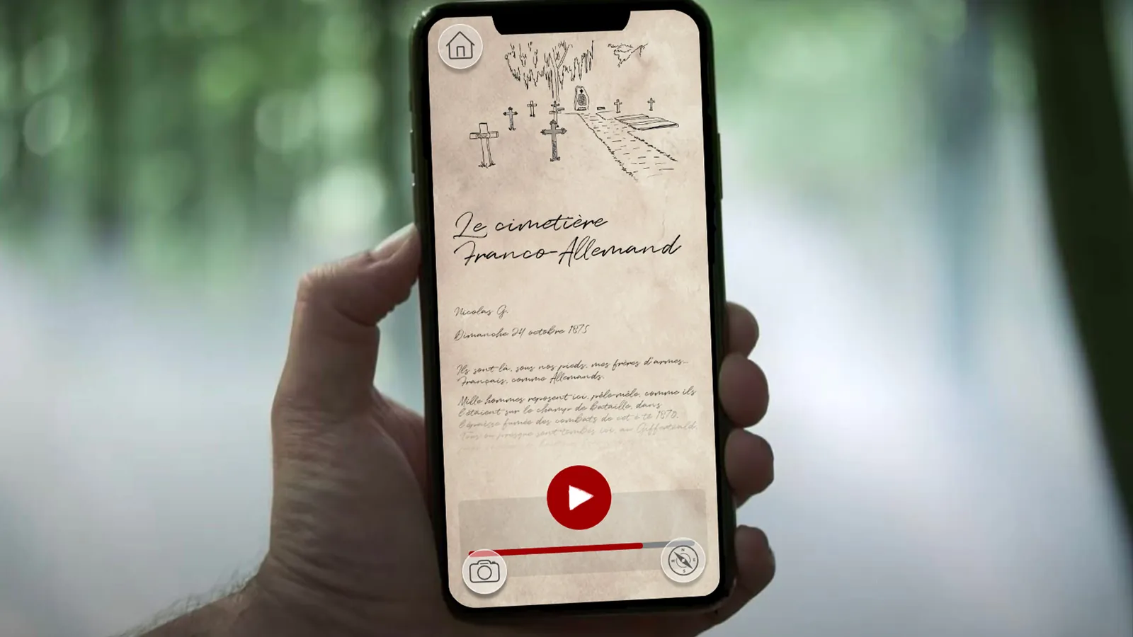 Smartphone affichant l'application Les Hauteurs de Spicheren, page du cimetière franco-allemand